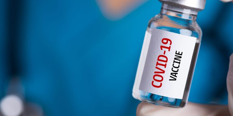 Who got at least one COVID-19 vaccine dose?