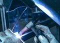 Welder Welding A Metal