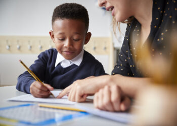teacher teaching student