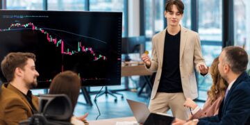 young-worker-leading-business-meeting-about-cryptocurrencies-office