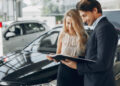 stylish-and-elegant-couple-during-sports-car-finance