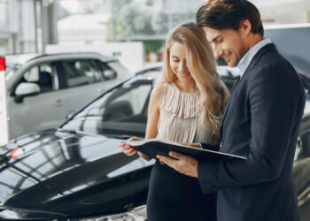 stylish-and-elegant-couple-during-sports-car-finance